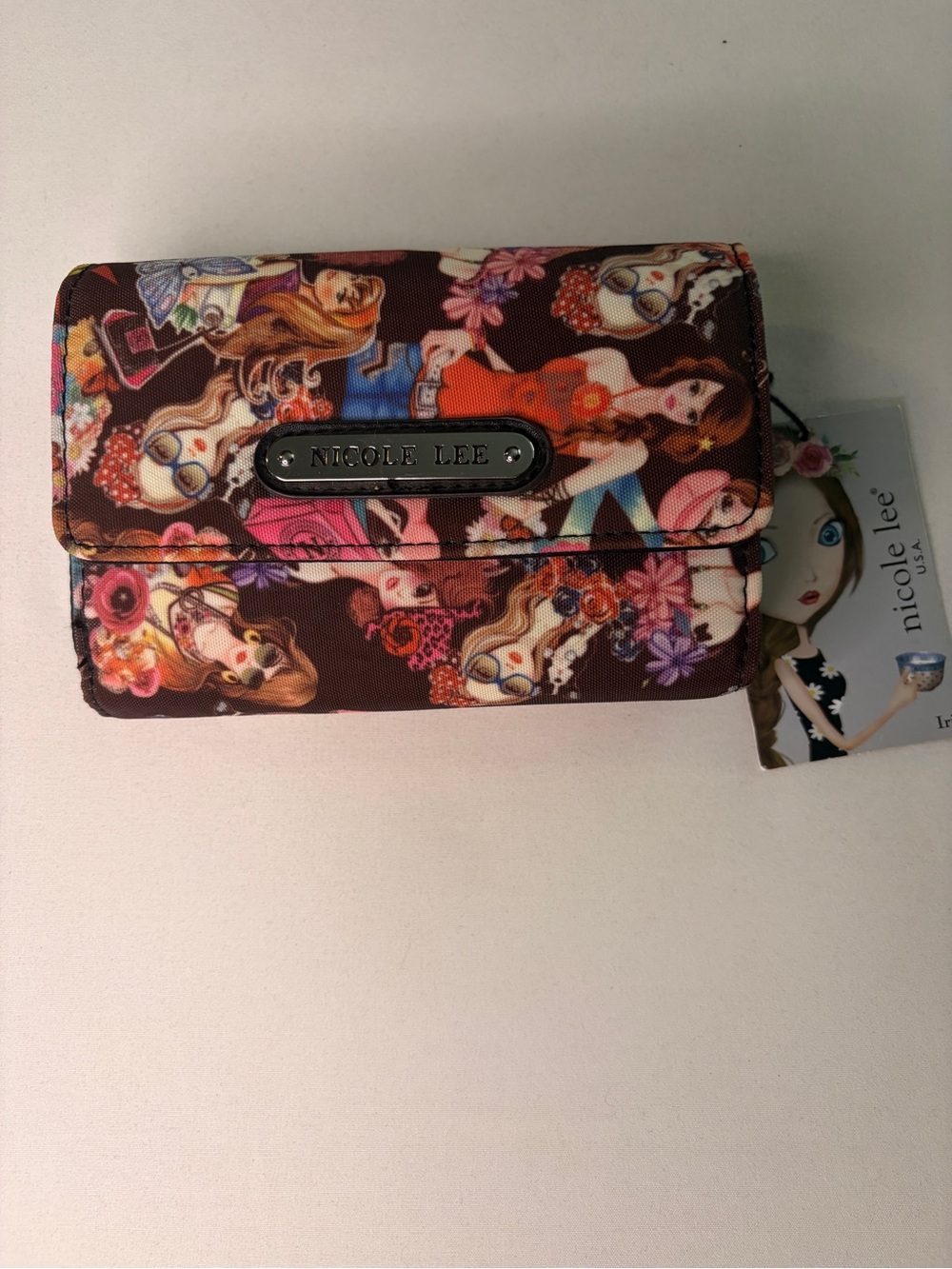 NWT Nicole Lee USA "Munecas" tri-fold wristlet/wallet.